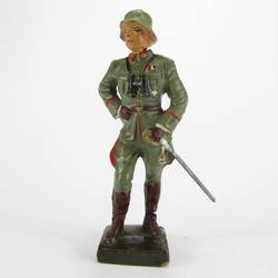 Lineol General standing, with binoculars and sword