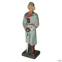 Lineol General standing in a coat, with binoculars and sword