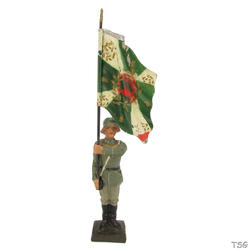 Lineol Flag bearer standing at attention, with traditional flag