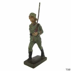 Lineol Soldier marching, rifle on shoulder