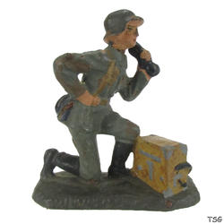 Lineol Signals soldier kneeling, with field telephone