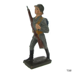Lineol Soldier marching, rifle in front of chest