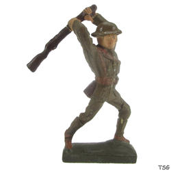Lineol Soldier standing, striking with rifle