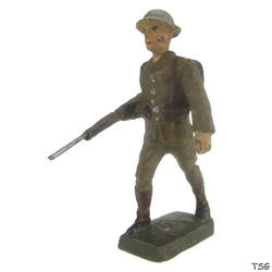 Lineol Soldier marching, bearing rifle under the arm