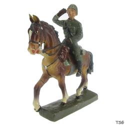 Lineol Adjutant riding on horseback, greeting