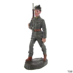 Tipple-Topple Soldier marching, slinged rifle