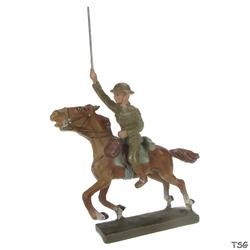 Lineol Officer on galopping horse, with raised sword