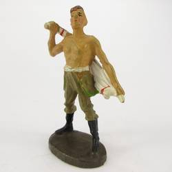 Soldier standing, drying himself