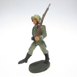 Elastolin Soldier marching in goose step, rifle on shoulder